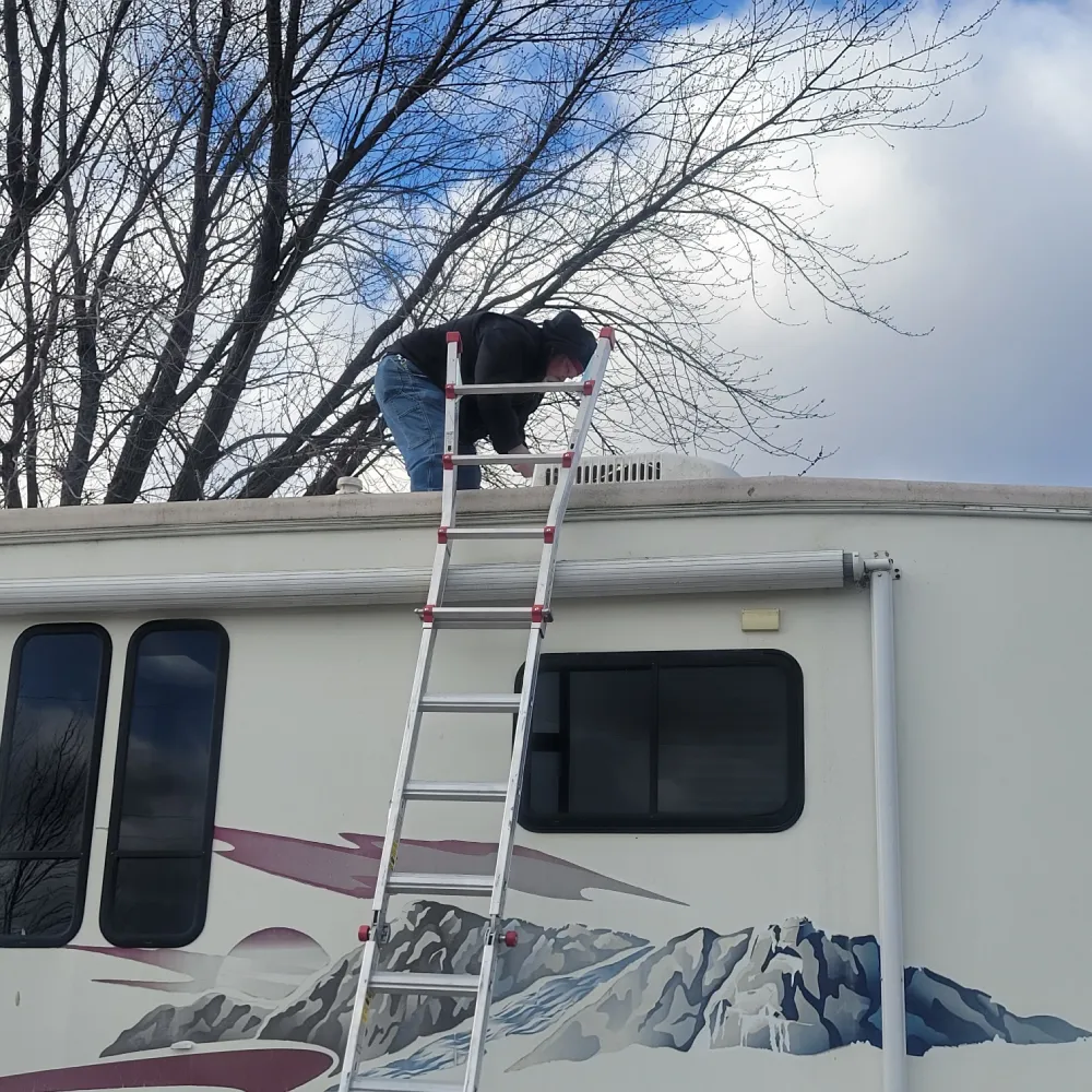 RV Camper on the beach at sunset